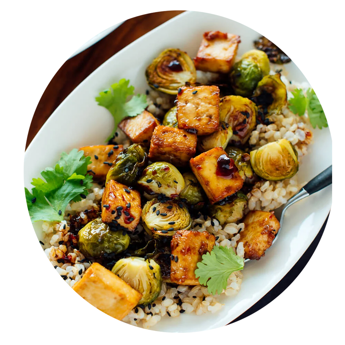Crispy glazed cubes with roasted brussels sprouts